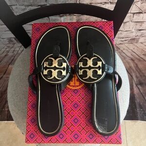 Tory Burch Black and Gold Logo Thong Sandals